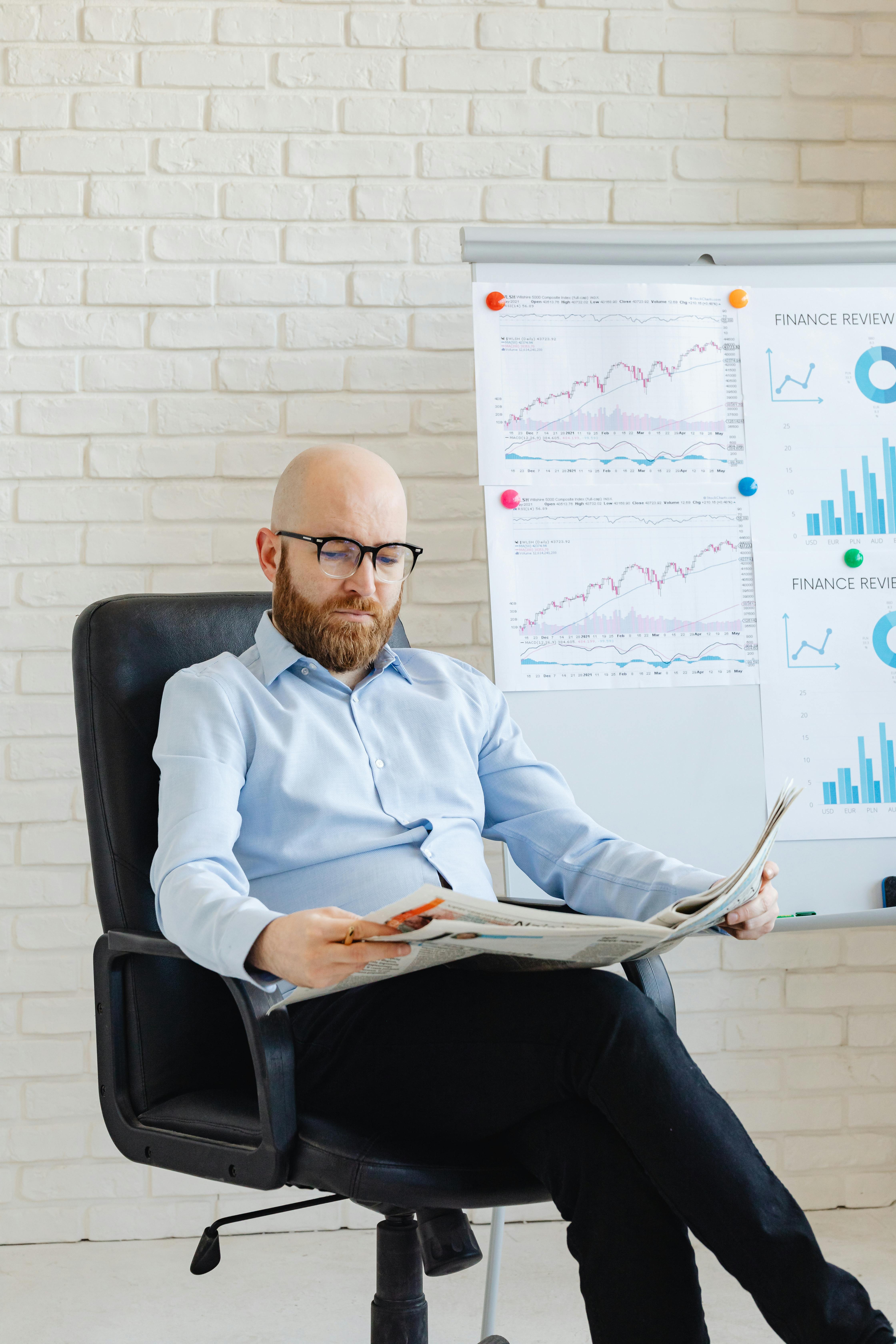 Club owner analysing financial reports and planning 2026 budget for business growth